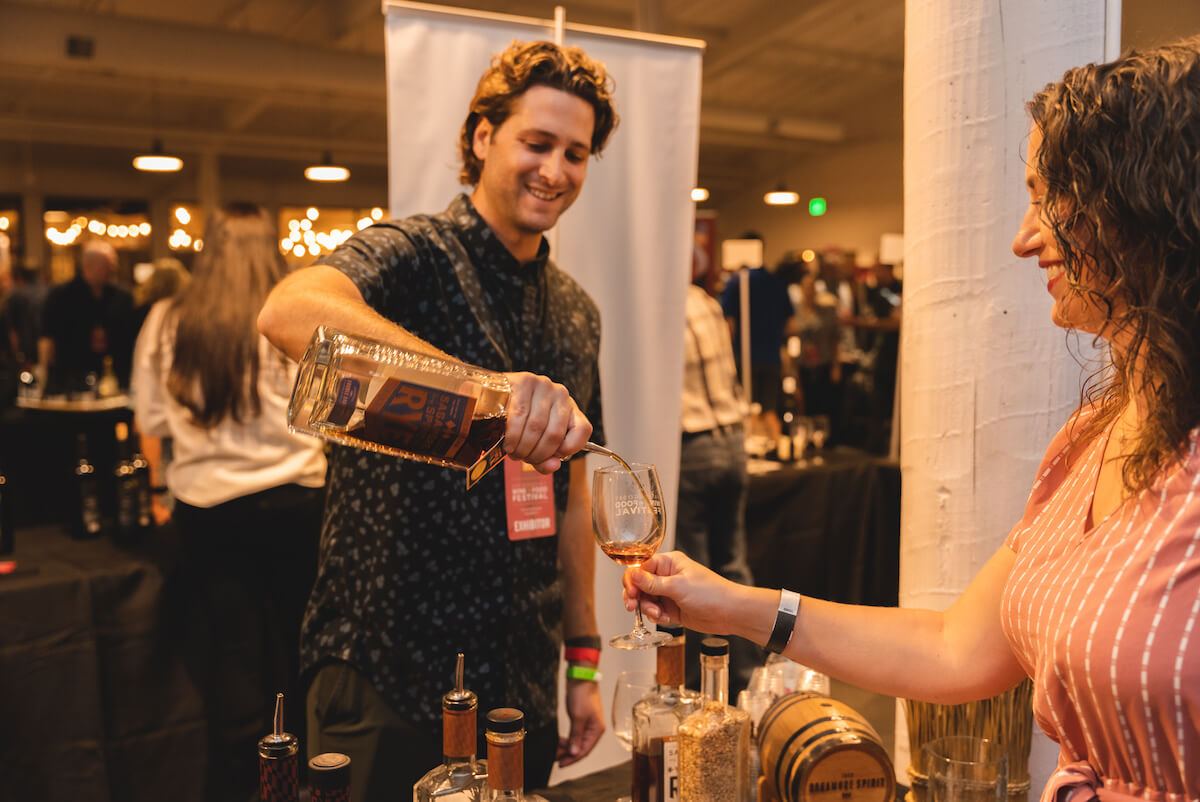 A producer pouring at Icons + Legends