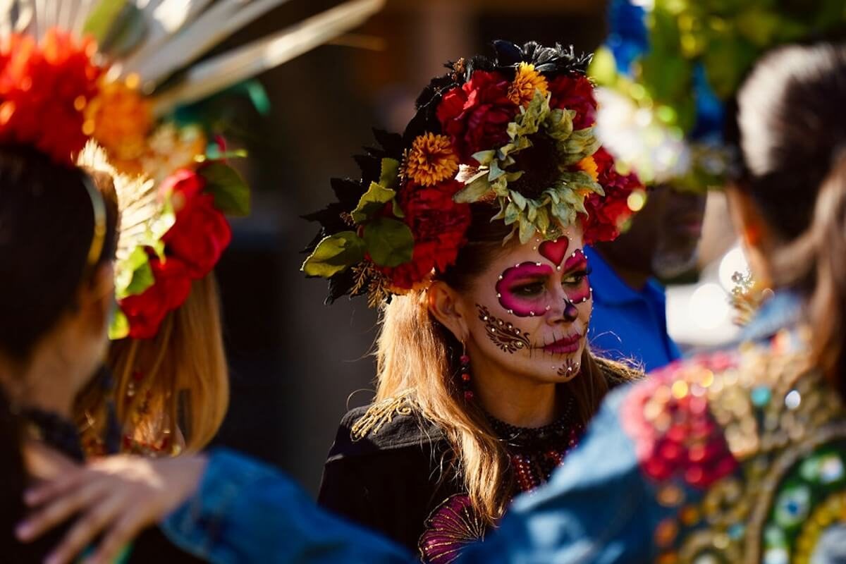 A catrina in a flower crown at Grand Fiesta