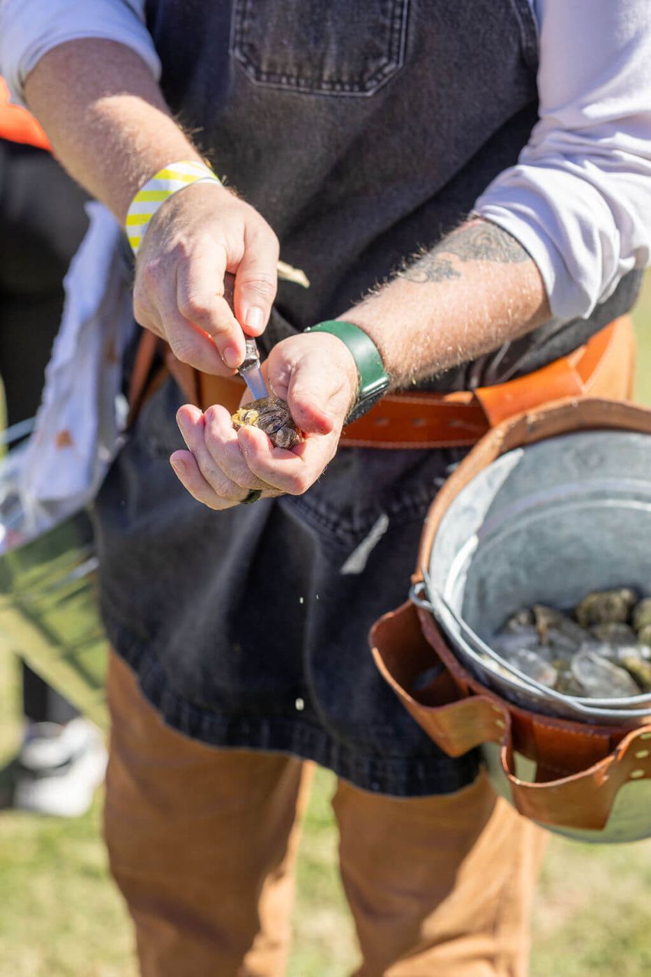 A chef finishing a plate
