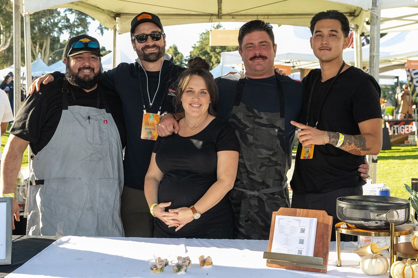 A restaurant team at their tasting station