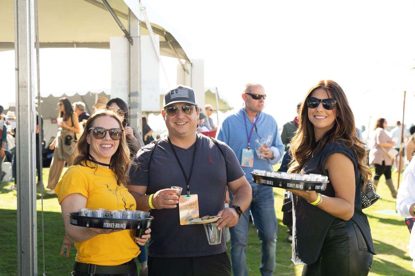 Guests sampling bites between the tents