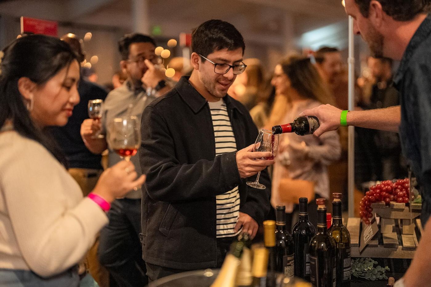 Guests tasting at a producer's table