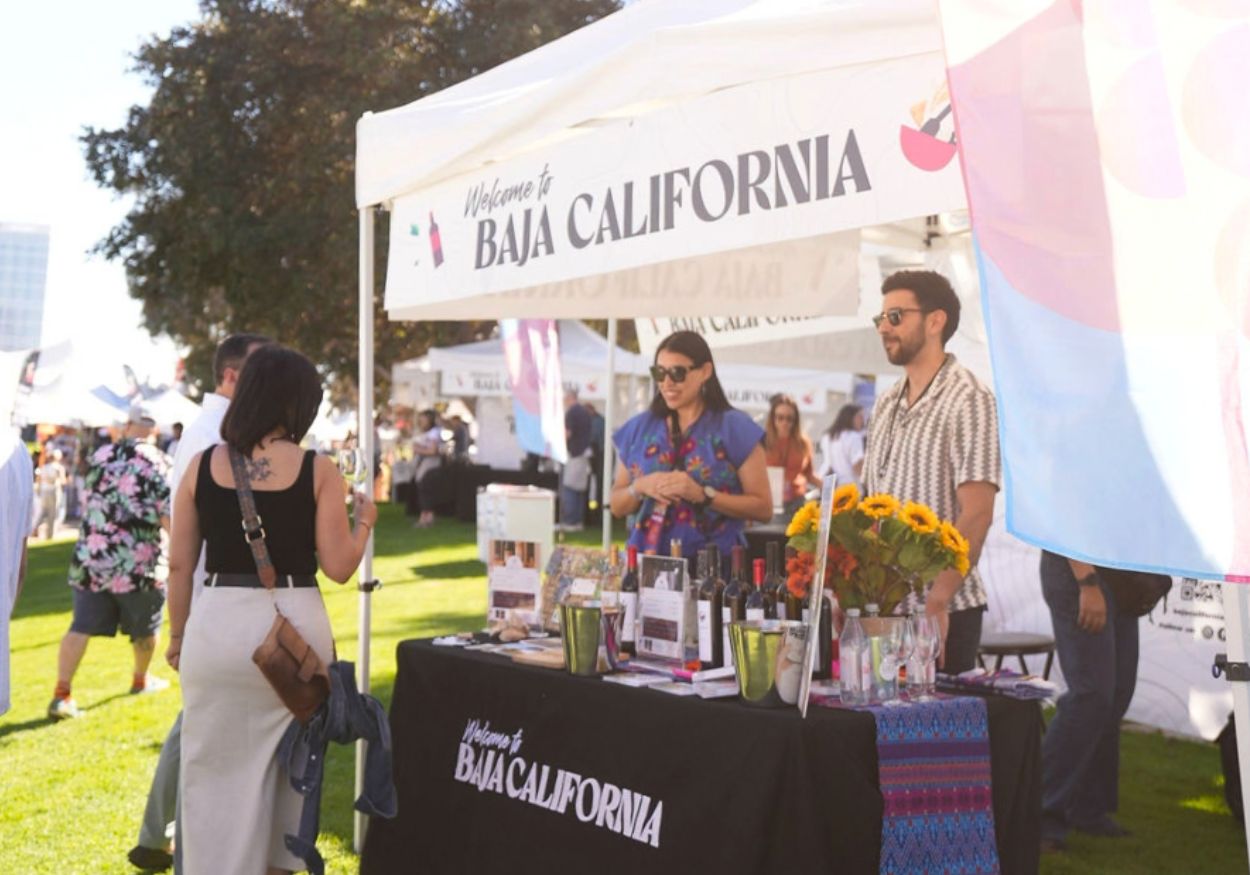 Guests visit the Baja California booth on the festival lawn