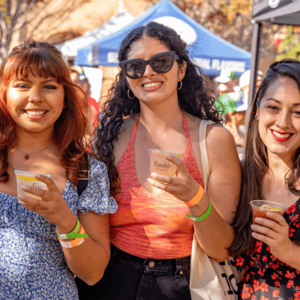 Attendees enjoying Frankly organic vodka at San Diego Bay Wine & Food Festival Grand Fiesta