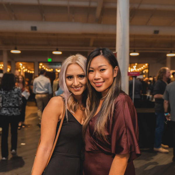 Attendees posing for a photo at San Diego Bay Wine & Food Festival Grand Decant