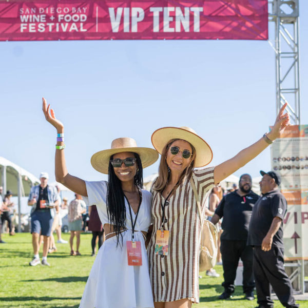 Mish Critiques standing in front of VIP Tent at San Diego Bay Wine & Food Festival Grand Tasting